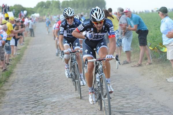 Fabian Cancellara receives word from the team car.