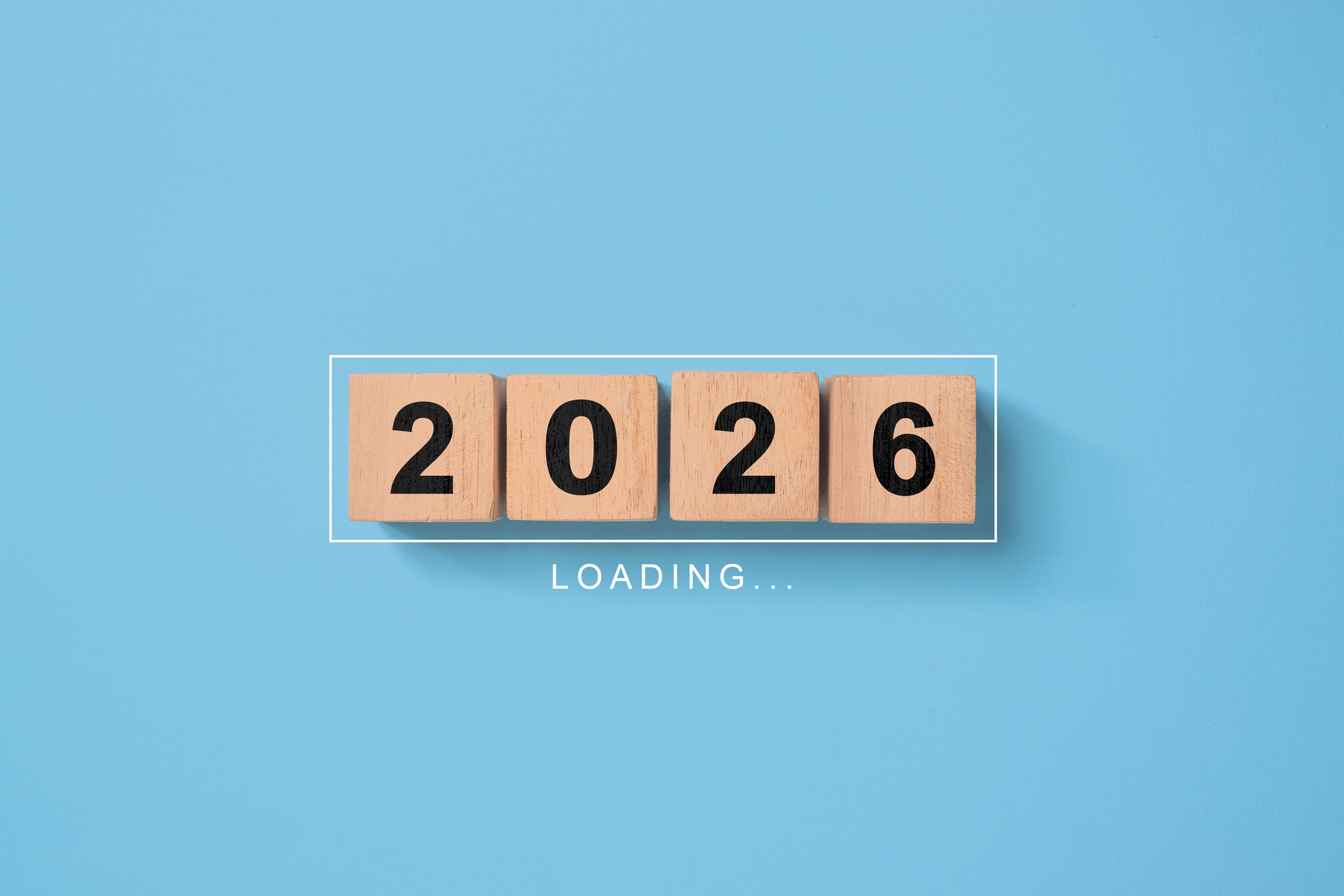 the year 2026 on wooden blocks above the word loading
