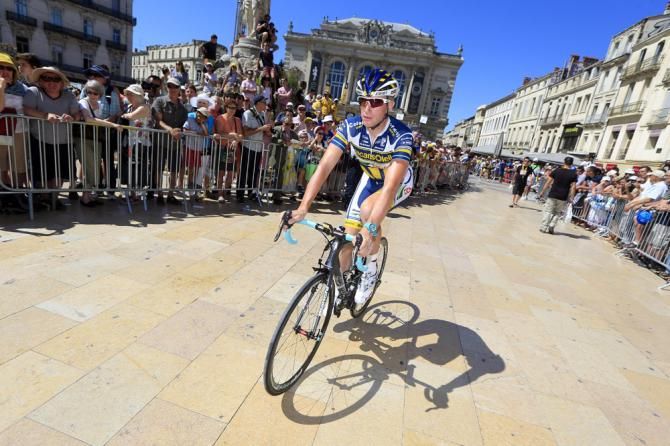 Lieuwe Westra (Vacansoleil-DCM) rolls to the sign-on stage in Montpellier amidst big crowds
