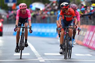 Vincenzo Nibali has words for Hugh Carthy at the end of stage 16 at the Giro