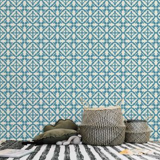 blue wallpaper like tiles, baskets, stripe rug