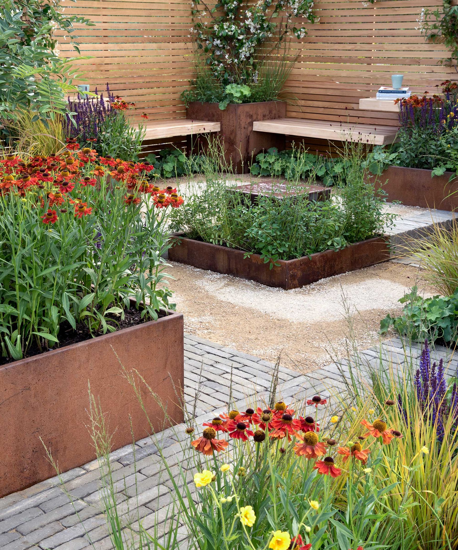 corten steel raised beds in garden at Hampton Court Garden Festival 2022