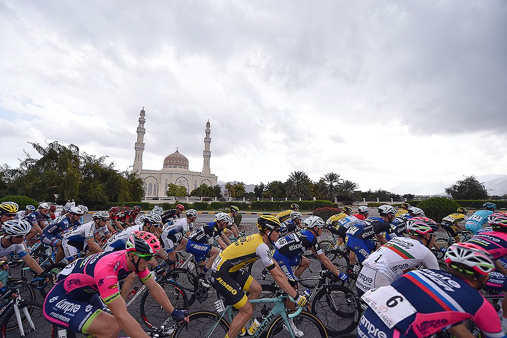 The peloton passes a mosque during stage 2 in Oman.