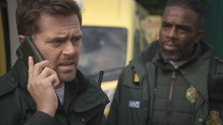 Jacob looks shocked at Iain in TV show Casualty.