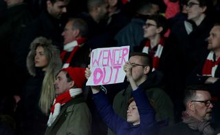 A 'Wenger Out' sign