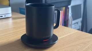 Ember smart mug on a wooden desk