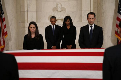 Obamas pay their respects to Justice Scalia. 