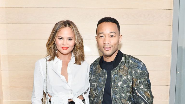 los angeles, ca august 10 chrissy teigen and john legend attend intermix x alc on duty launch dinner with chrissy teigen at jon and vinnys on august 10, 2017 in los angeles, californi photo by stefanie keenangetty images for intermix x alc