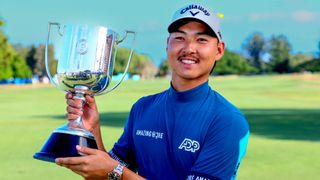 Min Woo Lee with the Australian PGA Championship trophy