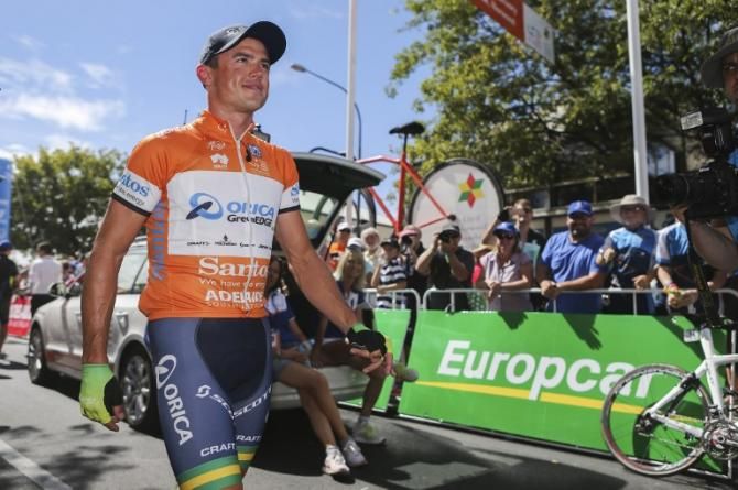 Simon Gerrans on his way to sign in
