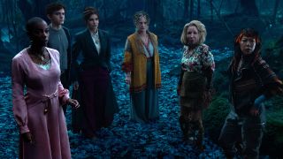 Agatha and her assembled coven stand on The Witches' Road in Marvel's Agatha All Along