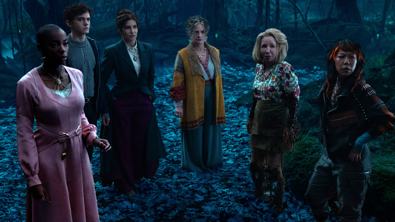 Agatha and her assembled coven stand on The Witches' Road in Marvel's Agatha All Along