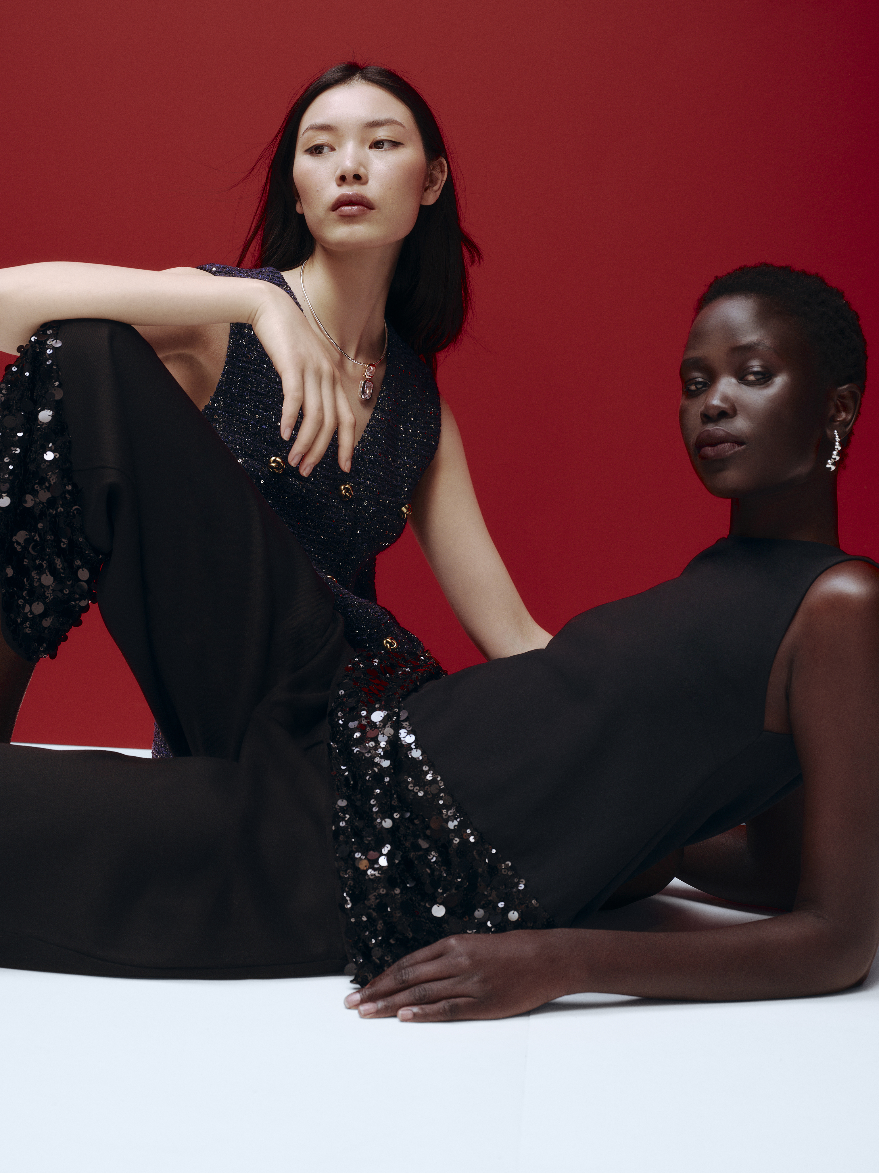 two models wearing black clothes with sequins from M&amp;amp;S