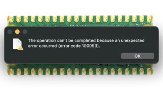 The error message above a Raspberry Pi Pico board