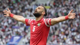 Yazan Al Arab of Jordan celebrates scoring ahead of the Jordan vs Qatar Asian Cup final