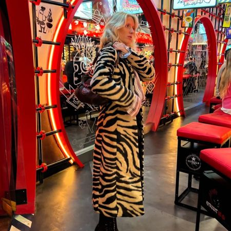 Fashion creator Laura T&oslash;nder wearing a tiger print jacket.