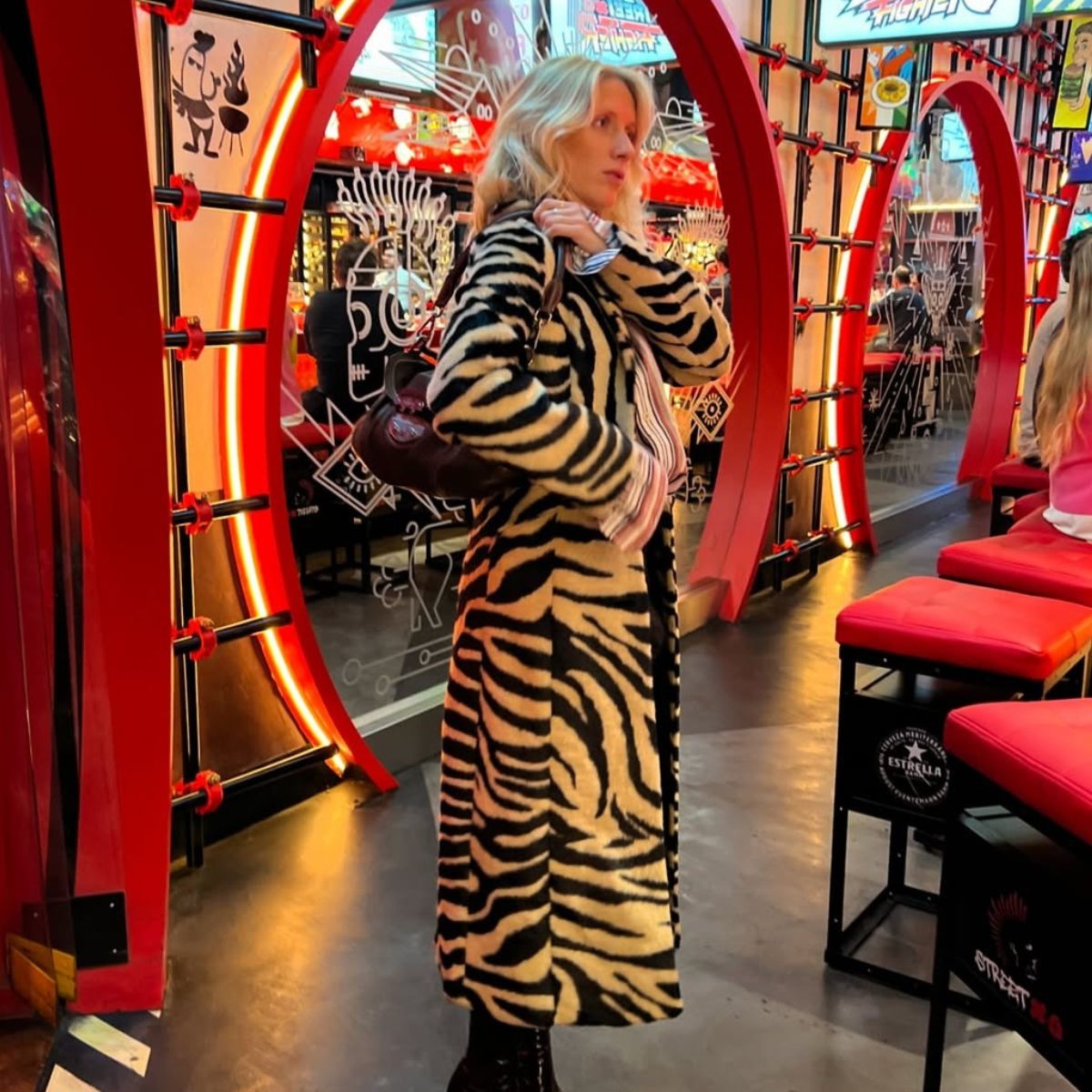 Fashion creator Laura T&oslash;nder wearing a tiger print jacket.