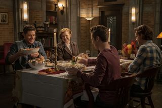 The gang sits down for supper in Supernatural.