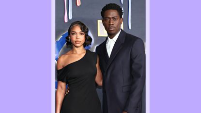 Lori Harvey and Damson Idris pose arm in arm as the attend the Red Carpet Premiere Event for the Sixth and Final Season of FX's "Snowfall" at Academy Museum of Motion Pictures, Ted Mann Theater on February 15, 2023 in Los Angeles, California/ in a purple template