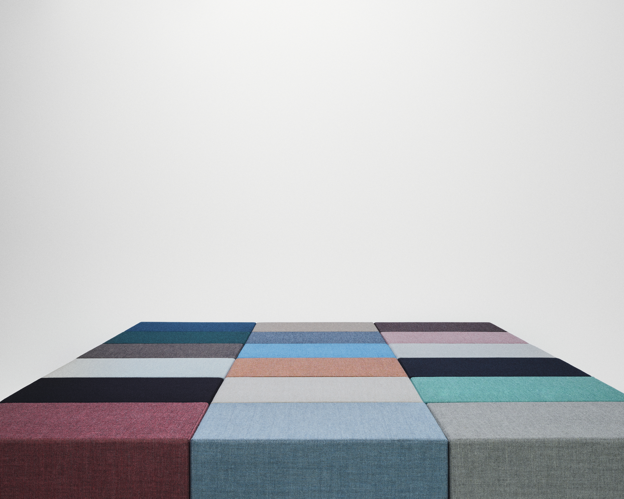 Upholstered cubes illustrating Kvadrat textile colours