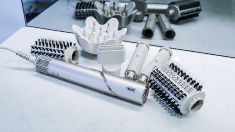 Shark FlexStyle hair-styling device with its attachments on a bathroom table