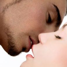 girl and guy kissing