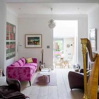 living room with white wall and sofa