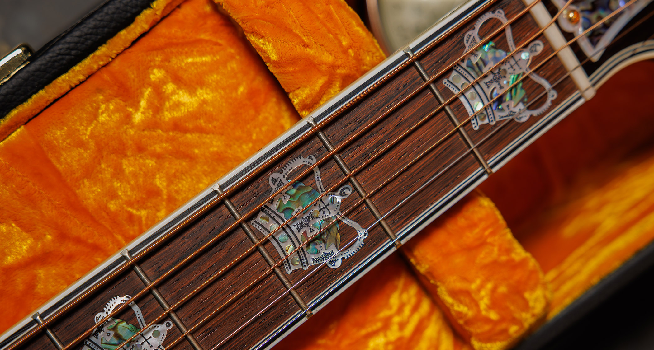 Gibson Custom SJ-200 Monarch #100: this stunning one-of-one jumbo is replete with all kinds of rococo flourishes, from the diamond and gold crown inlay on the headstock, to the 14k gold rope binding, Gibson calls it the "ultimate custom" acoustic and not without some justification.