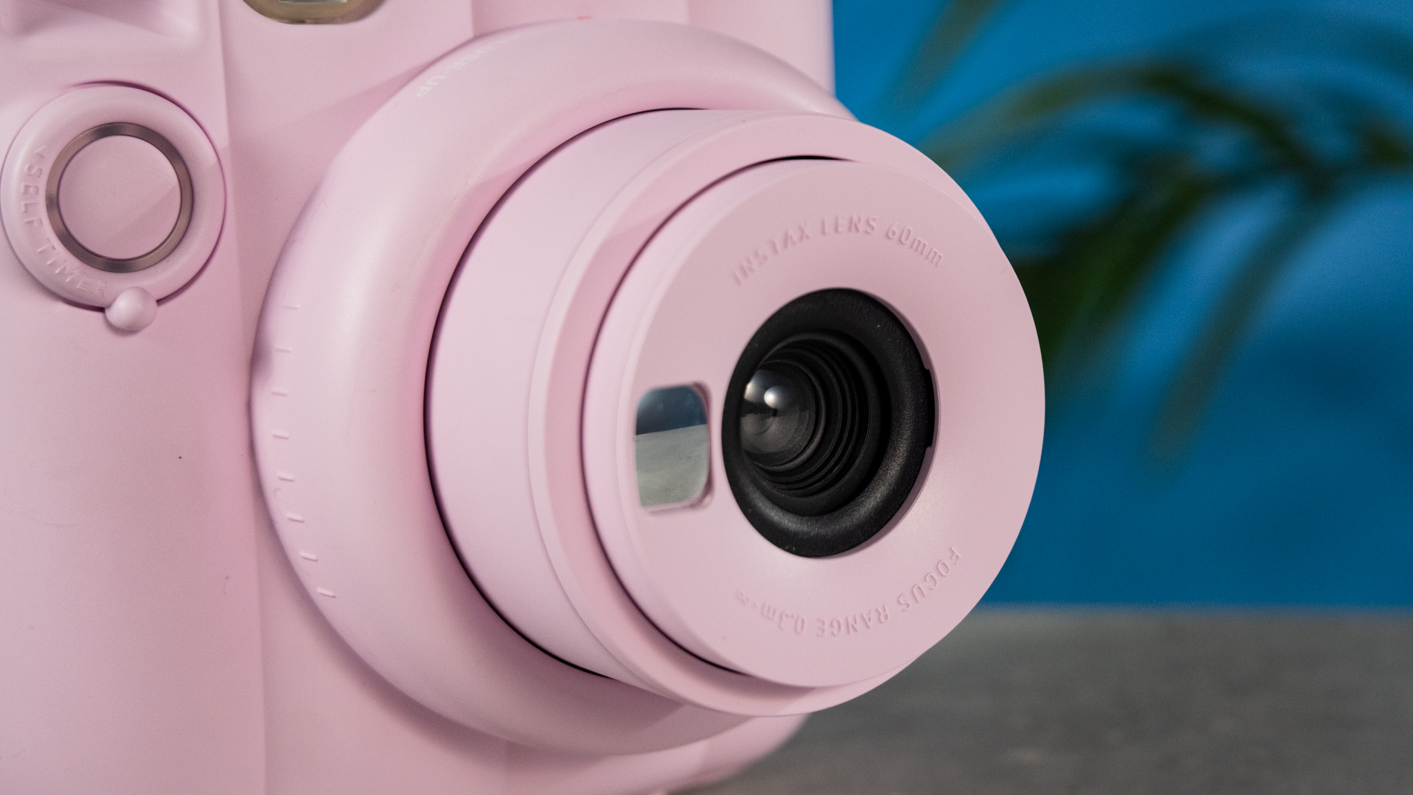 A Candy Pink Fujifilm Instax mini 13 instant camera