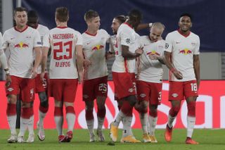 RB Leipzig’s Angelino (second) from right celebrates sealing a 2-0 win against Istanbul Basaksehir