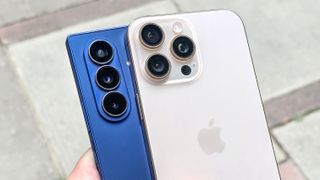 Samsung Galaxy Z Fold 7 and iPhone 16 Pro Max held together