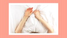 woman with her hands above her head on a bed with white sheets, with a pink border around the image