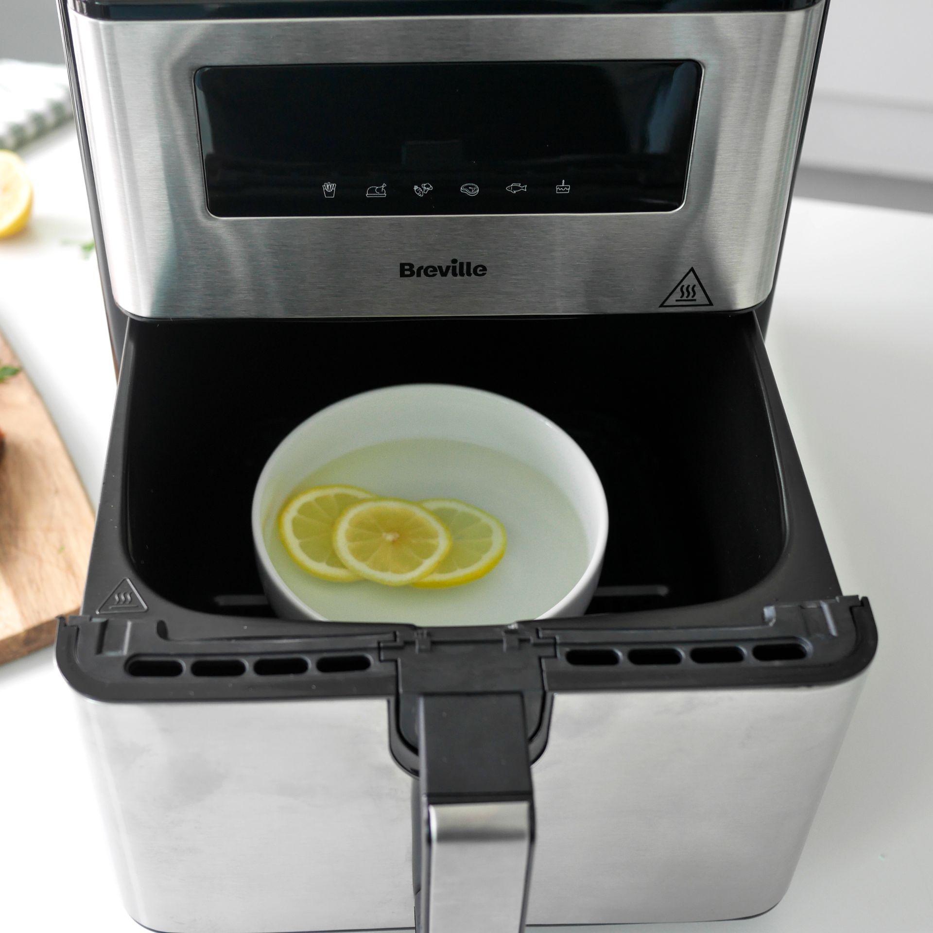 The lemon air fryer cleaning hack for a quick and easy clean | Ideal Home