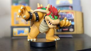 Bowser Amiibo Video Game Cartridges In Background