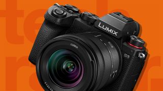 best 4K camera from Lumix on an orange background