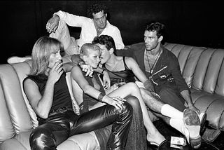 Guests in conversation on a De Sede DS 600 sofa, Studio 54, New York 1979