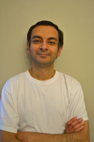 Astrophysicist Gaurav Khanna of UMass Dartmouth connects Sony PlayStation3 gaming systems into a single system, a supercomputer he and his colleagues use to study black holes.