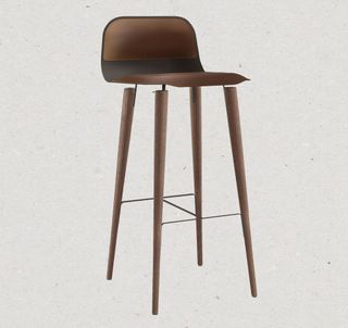 ‘Barr’ stool a design consultant for Barr, featuring a blackened steel seat, leather upholstery and conical oak legs