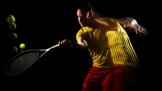 A stroboscopic flash portrait of a tennis player in a studio on a black background wearing a yellow shirt