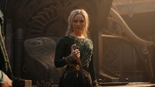 Galadriel looks at the camera while holding a knife in The Rings of Power season 1