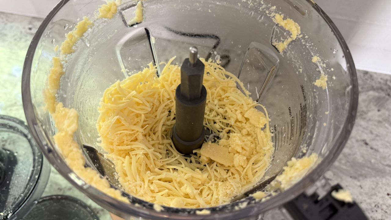 Ninja CrushBOSS shredding Swiss cheese