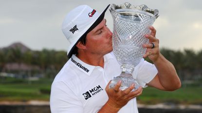 Joel Dahmen kisses the trophy after winning the 2021 Corales Puntacana Championship 