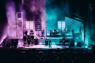 pink and blue light on set ofThe 1975 stage Design in london