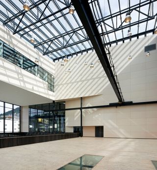 Interior of Bergen Academy of Arts and Design showcasing its white and steel decor
