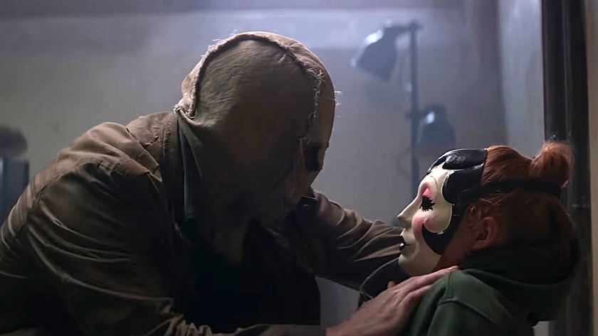 Scarecrow is shown putting a mask on Maya in The Strangers: Chapter 3.