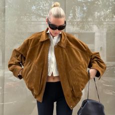 Elsa Hosk wears ballet flats with capri pants.