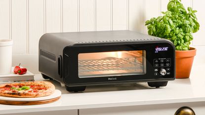 Electric pizza oven on kitchen counter