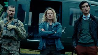 Troll (L to R) Mads Sjøgård Pettersen as Captain Kristoffer Holm, Ine Marie Wilmann as Nora and Kim S. Falck-Jørgensen as Andreas Isaksen in Troll Cr. Courtesy of Netflix © 2022