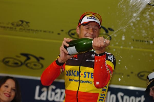 Tom Boonen enjoys opening his champagne.