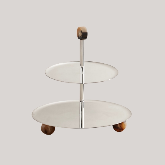 BRUNELLO CUCINELLIStainless steel and horn serving stand against a pale grey background.